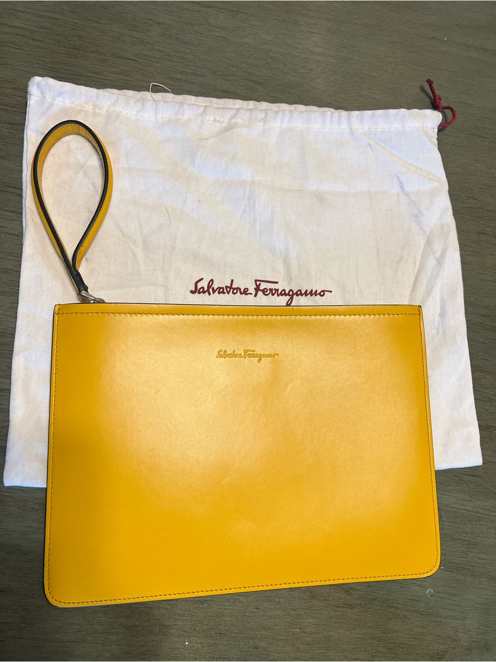 Salvatore Ferragamo Mustard Yellow Leather Wristlet Clutch with strap
